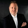 Joseph Caulkins, Conductor and Artistic Director of Key Chorale, Joins the Club